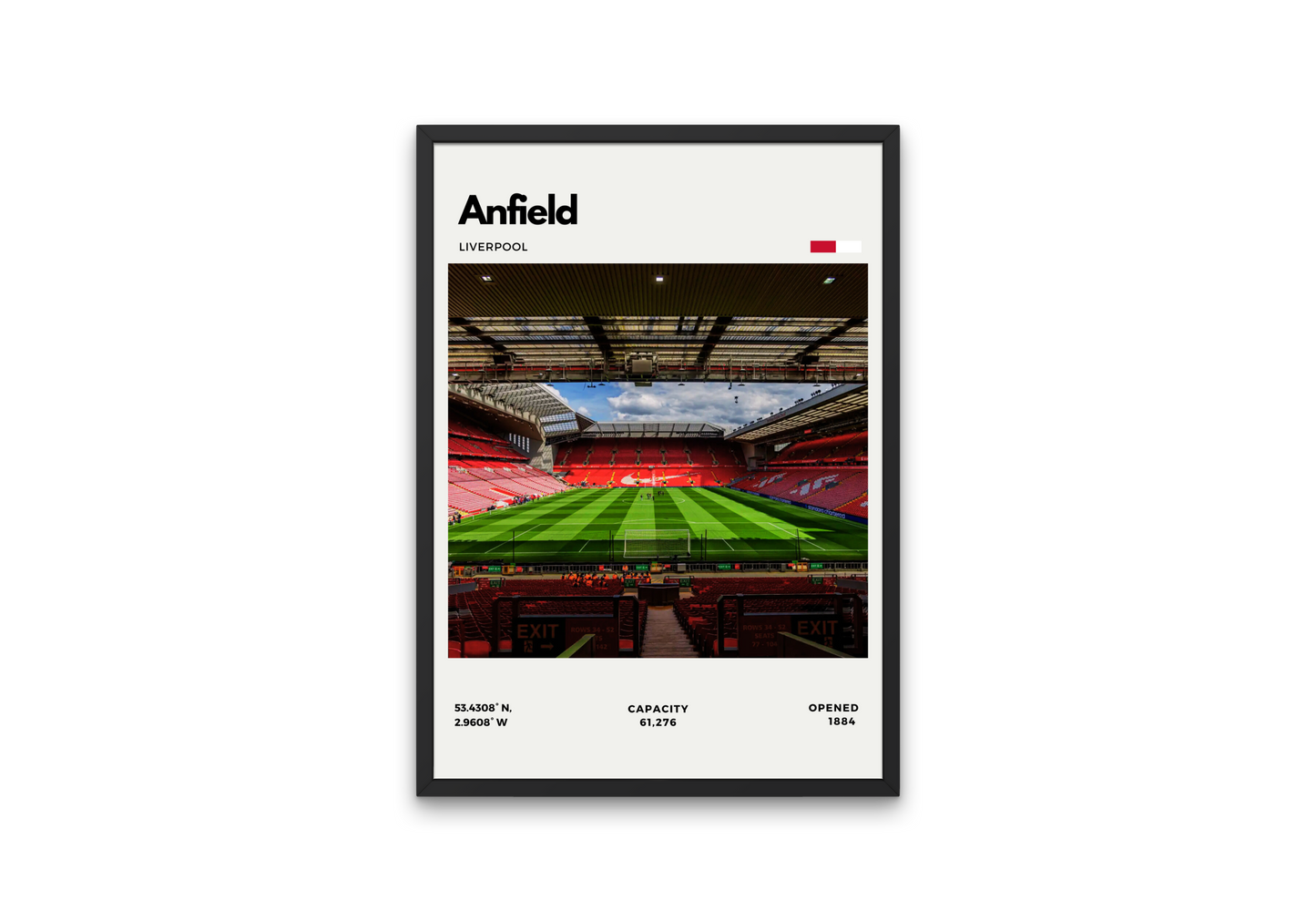 Framed poster of Anfield stadium with a view of the pitch and seating area.
