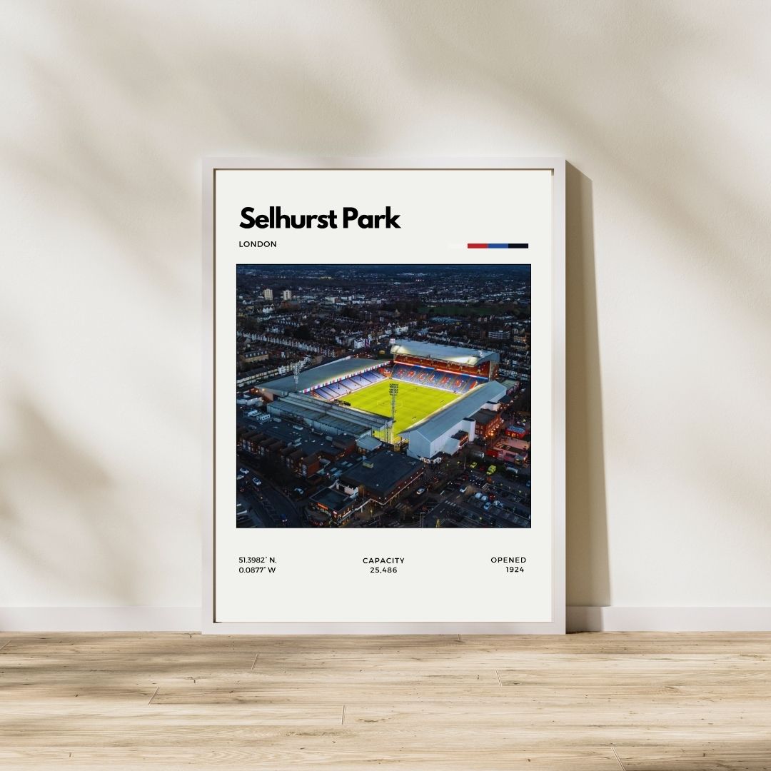 Framed poster of Selhurst Park stadium in London on a wall.