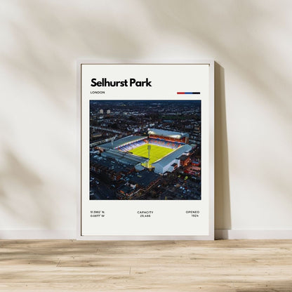 Framed poster of Selhurst Park stadium in London on a wall.