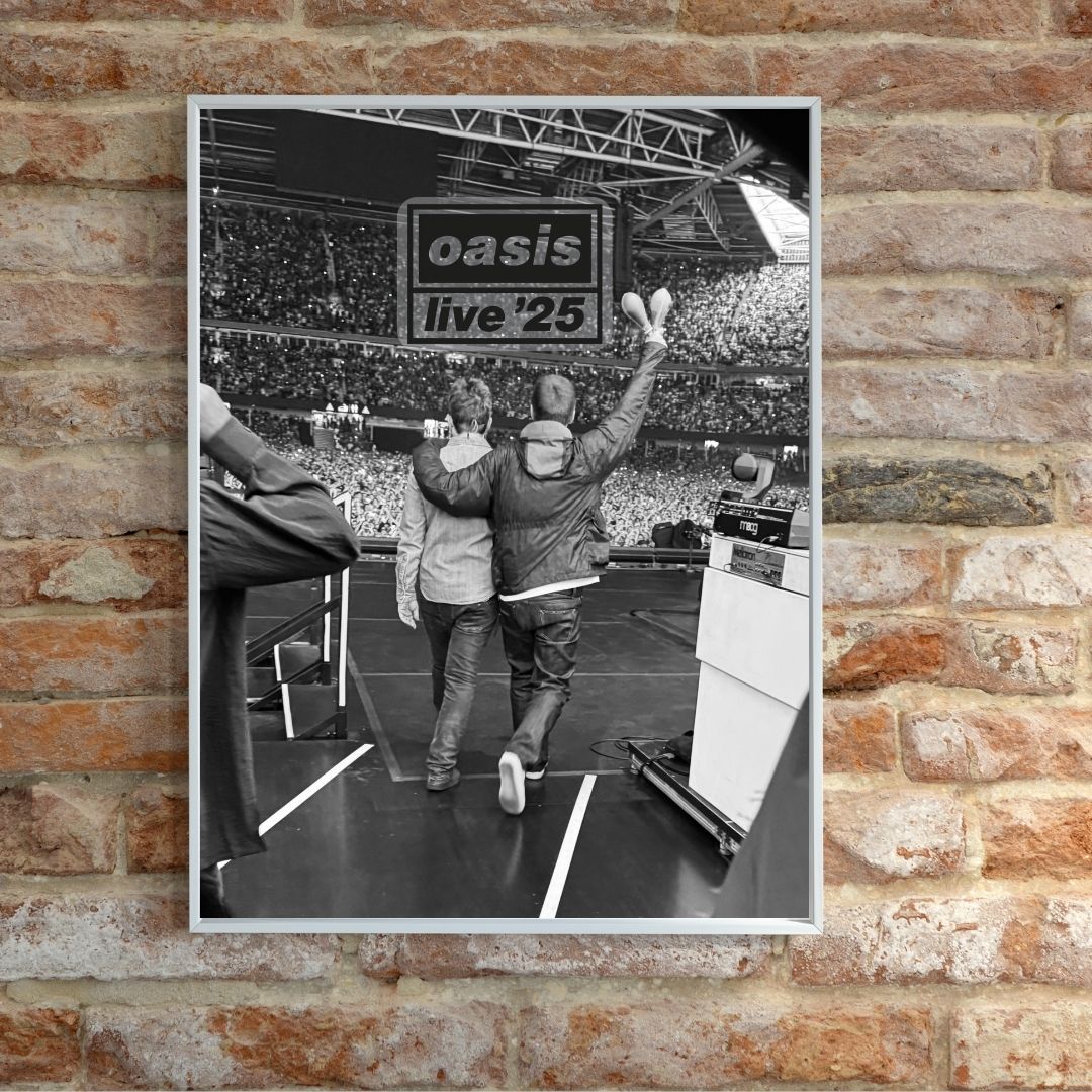 Framed poster of a concert scene with 'oasis live '25' text on a brick wall.