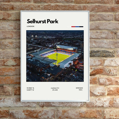 Framed poster of Selhurst Park stadium on a brick wall