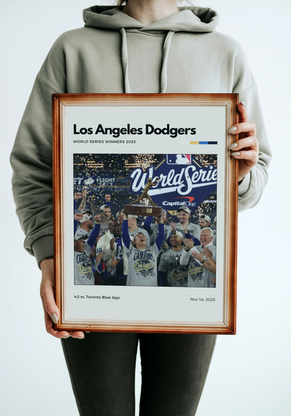 Person holding a framed Los Angeles Dodgers World Series poster