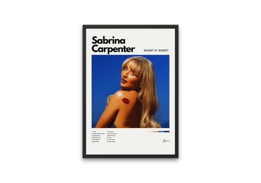 Framed poster of Sabrina Carpenter with a blue background and text.